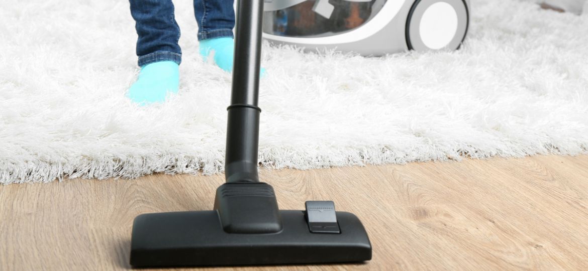 Woman skillfully using vacuum cleaner for multiple cleaning tasks